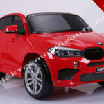 ELEKTROMOS KISAUTÓ BMW X6M 12V EREDETI LICENCE 2 SZEMÉLYES PIROS